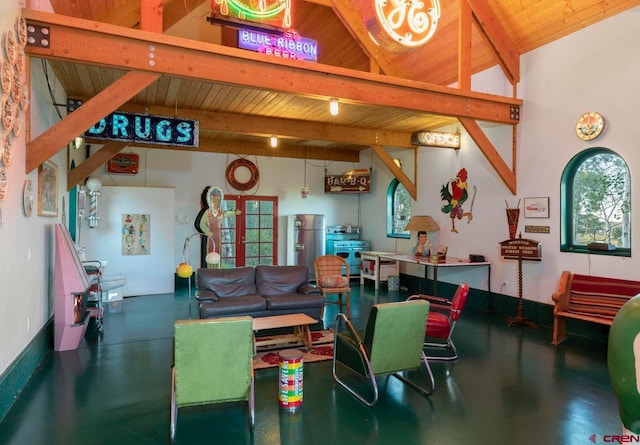1006 Top Of The World Dr, Placerville, CO 81430 - living room featuring wooden ceiling, lofted ceiling with beams, and a wealth of natural light