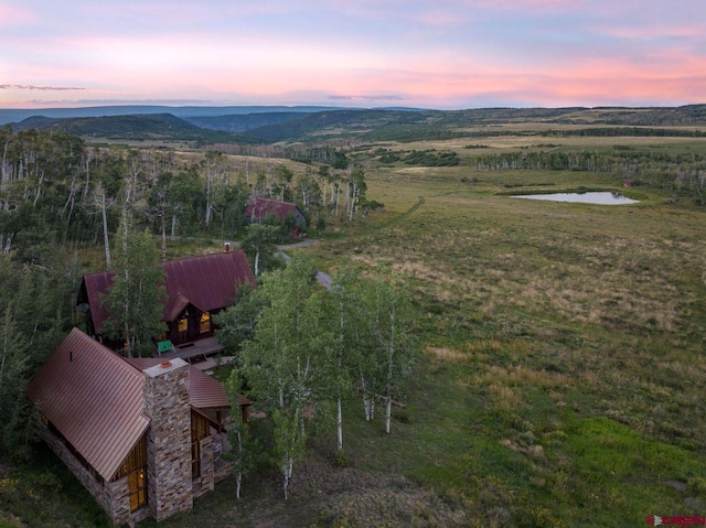 view of aerial view at dusk