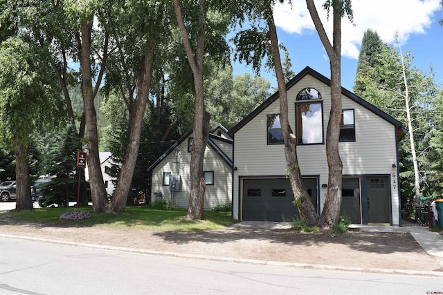 29 Whiterock Ave, Crested Butte, CO 81224 - view of front of home featuring a garage and driveway