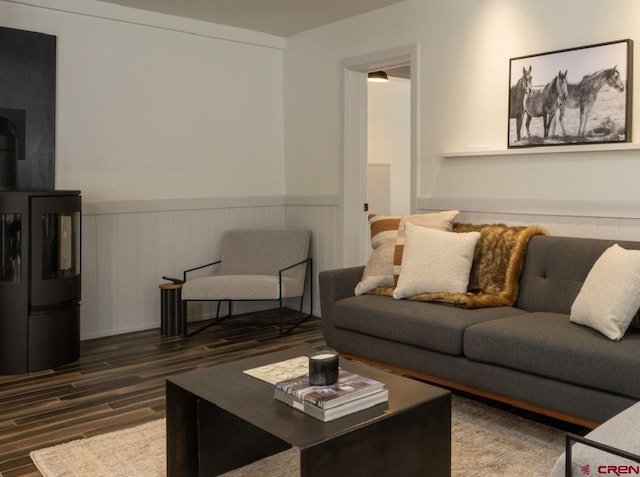 living room featuring dark wood-type flooring