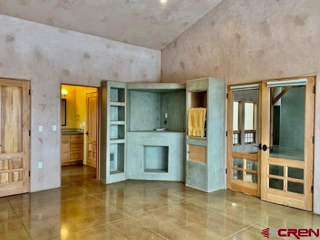 interior space featuring tile floors and french doors