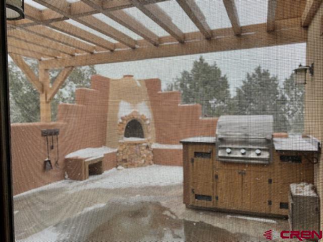 view of snow covered patio