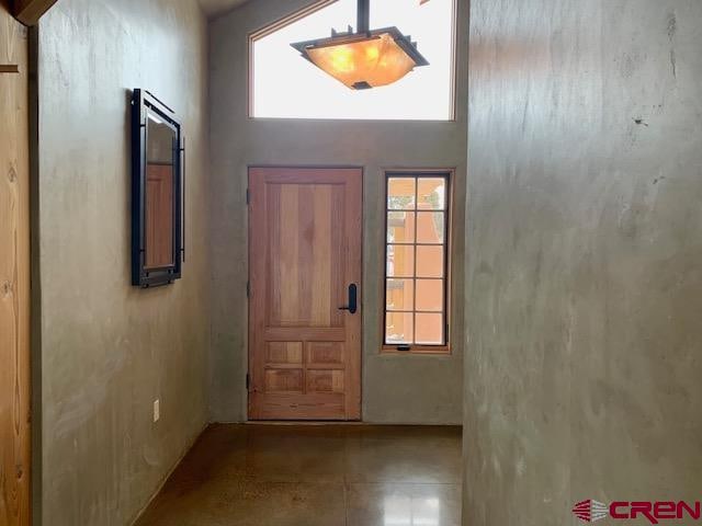 entryway featuring light tile floors