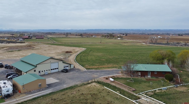 birds eye view of property featuring a rural view