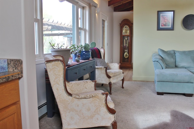 living room featuring beam ceiling and a baseboard radiator