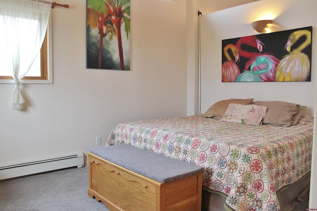 bedroom featuring a baseboard heating unit and light carpet