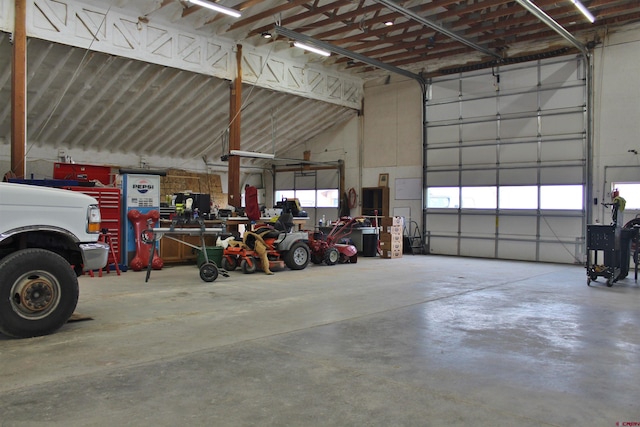 garage with a workshop area