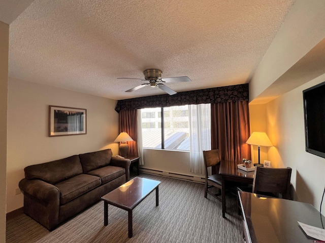 living room featuring a textured ceiling, carpet flooring, ceiling fan, and baseboard heating