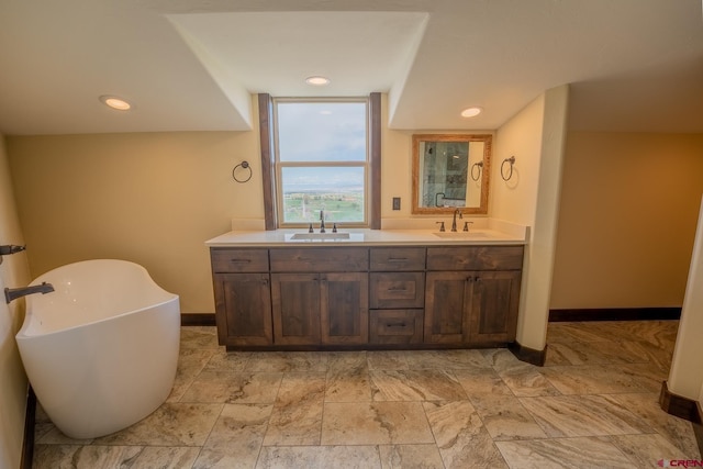 bathroom featuring tile flooring and dual vanity