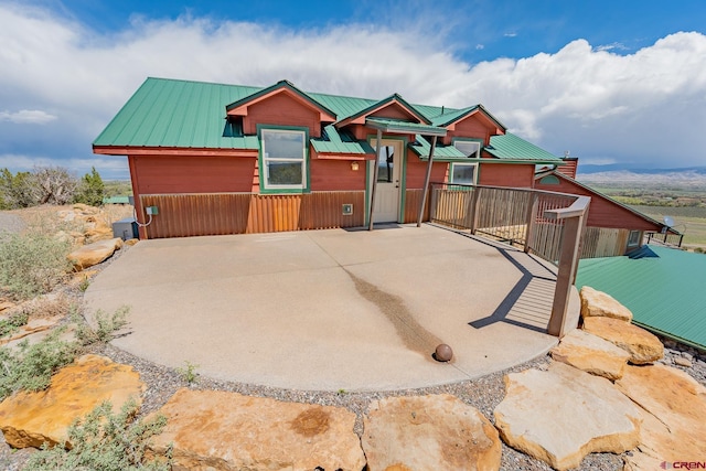 view of front of house with a wooden deck