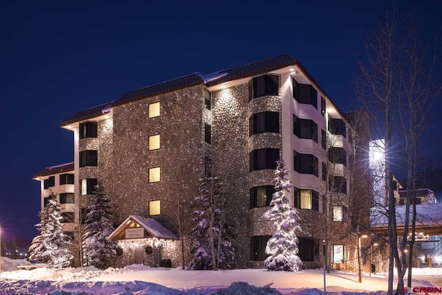 view of snow covered building