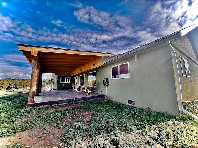 rear view of property with a patio