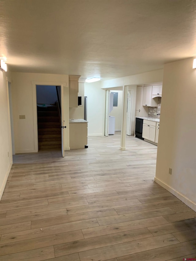 unfurnished living room with light hardwood / wood-style flooring