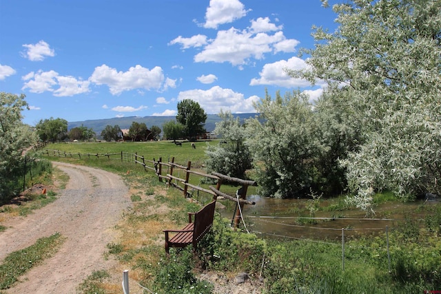 view of home's community featuring a rural view