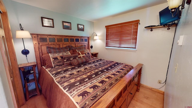 bedroom with wood-type flooring