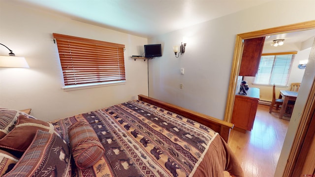 bedroom featuring hardwood / wood-style floors