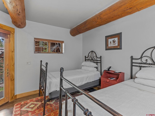 bedroom featuring dark hardwood / wood-style floors