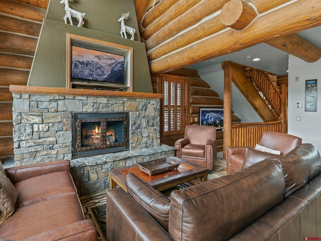 living room featuring log walls, a fireplace, and beam ceiling