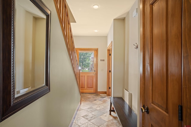 hall with light tile flooring