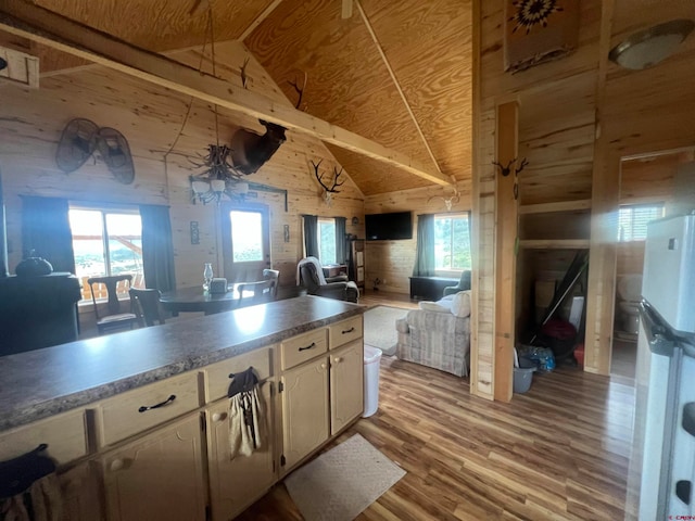 kitchen with wooden ceiling, high vaulted ceiling, light hardwood / wood-style flooring, and beamed ceiling