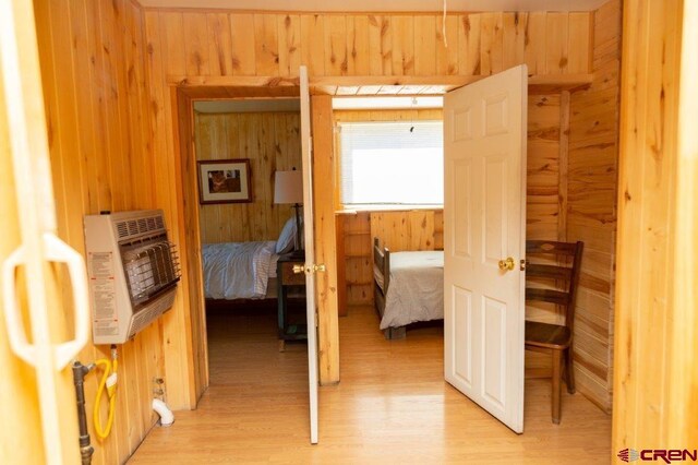 289 S Main St, Creede, CO 81130 - interior space featuring light wood-type flooring and wooden walls