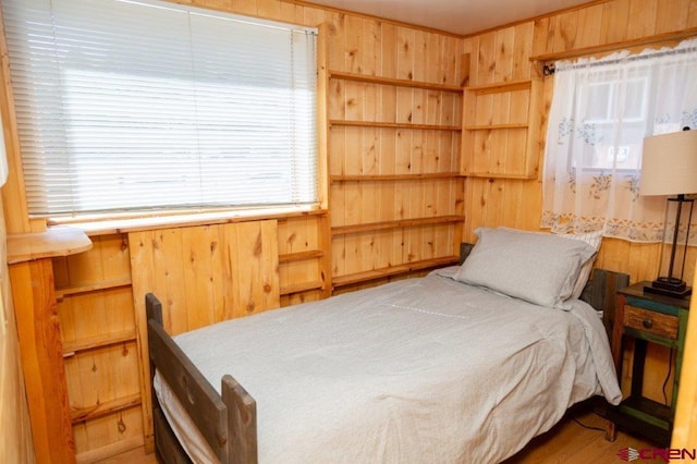 289 S Main St, Creede, CO 81130 - bedroom featuring wooden walls