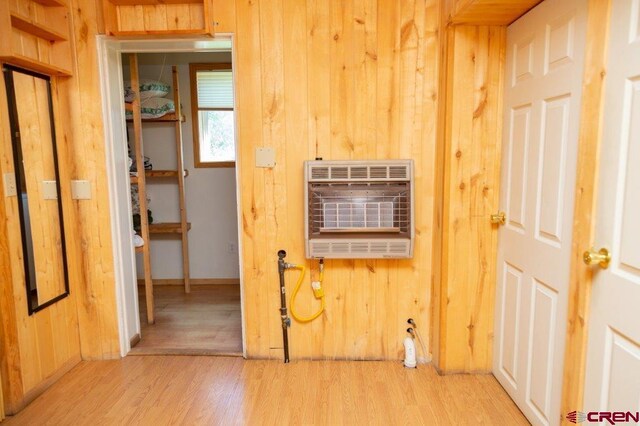 289 S Main St, Creede, CO 81130 - interior space featuring light hardwood / wood-style flooring and wood walls