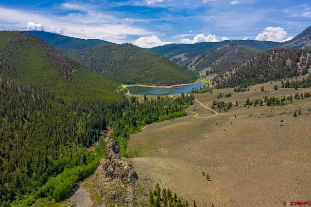 property view of mountains featuring a water view