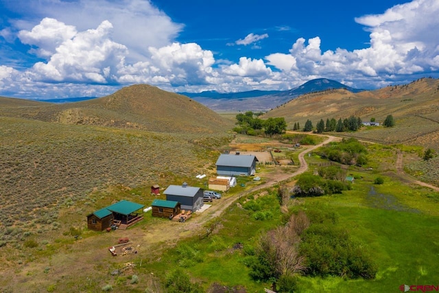 drone / aerial view featuring a mountain view