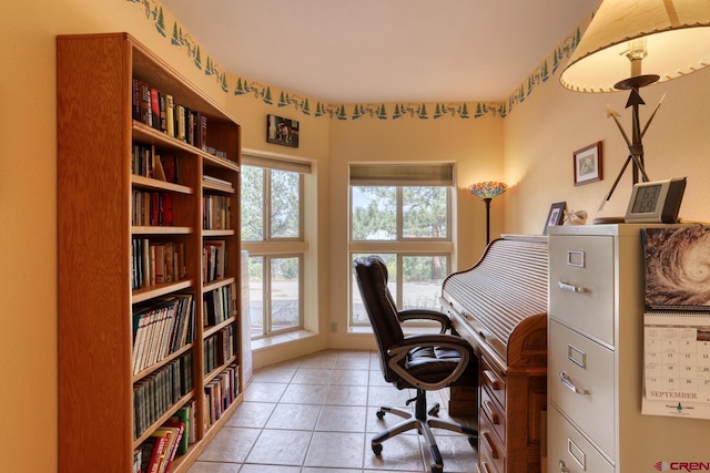 office space with light tile flooring