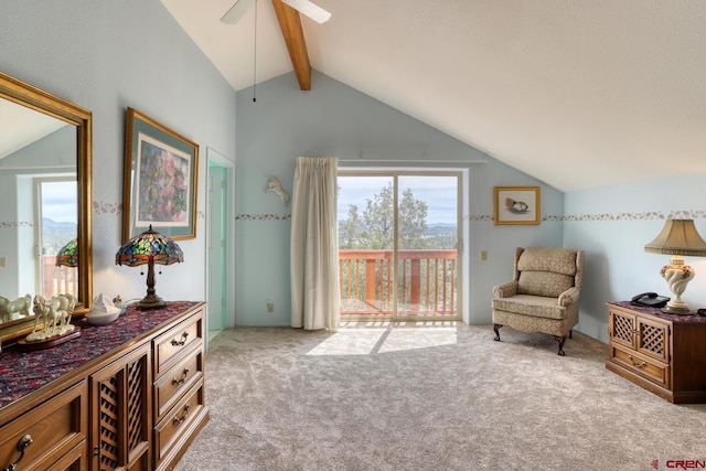 living area featuring ceiling fan, lofted ceiling with beams, and light carpet