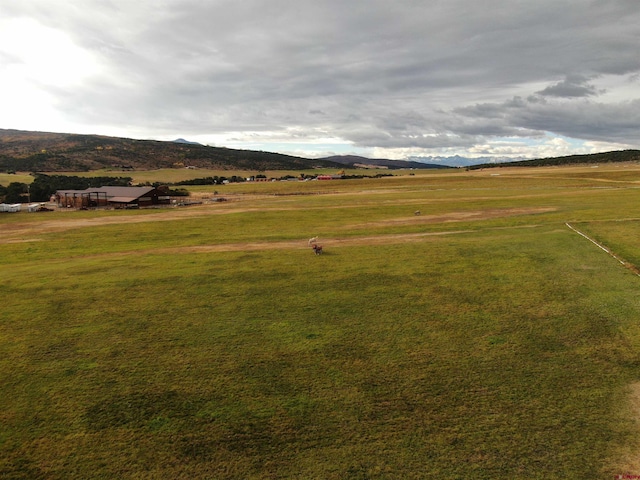 exterior space with a mountain view and a rural view