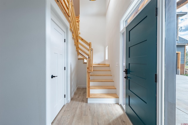 entrance foyer with light hardwood / wood-style floors