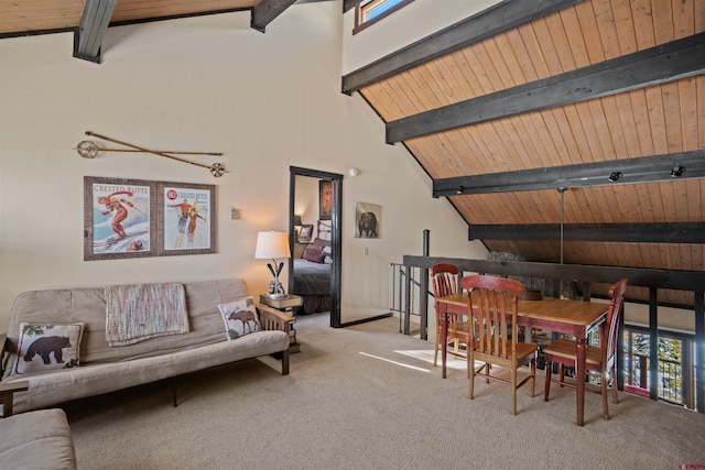 interior space featuring light carpet, high vaulted ceiling, beam ceiling, and wood ceiling