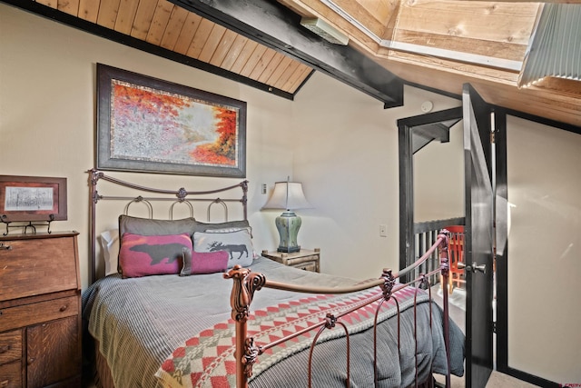 bedroom with lofted ceiling with beams, carpet, and wood ceiling