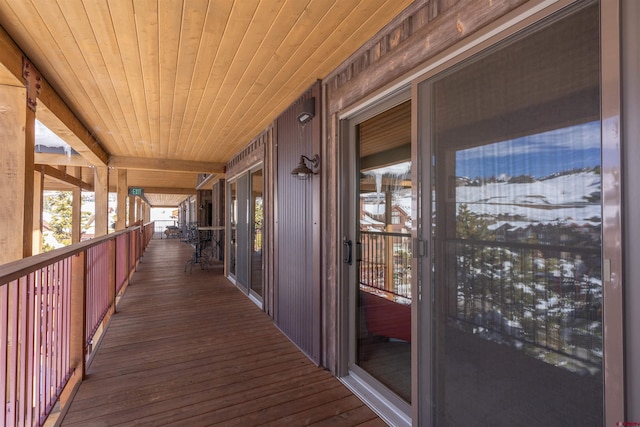 view of snow covered deck