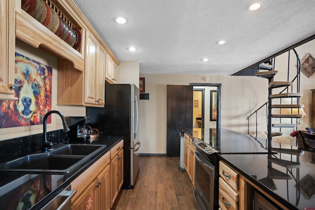 kitchen featuring sink, range with electric cooktop, dishwashing machine, dark wood-type flooring, and a textured ceiling