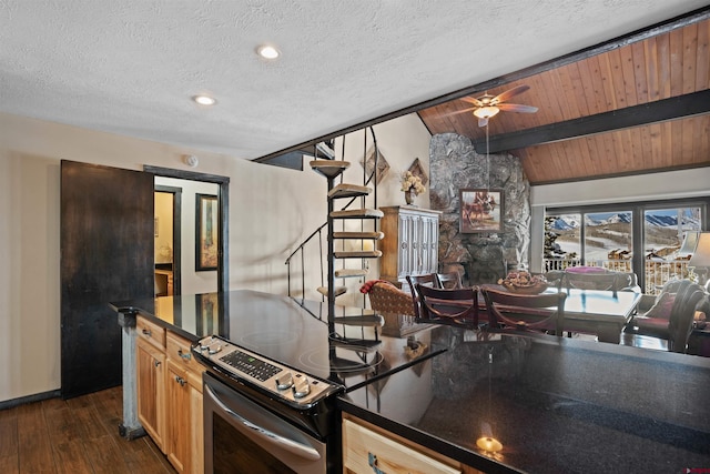 kitchen featuring ceiling fan, dark hardwood / wood-style flooring, wood ceiling, lofted ceiling with beams, and stainless steel electric stove