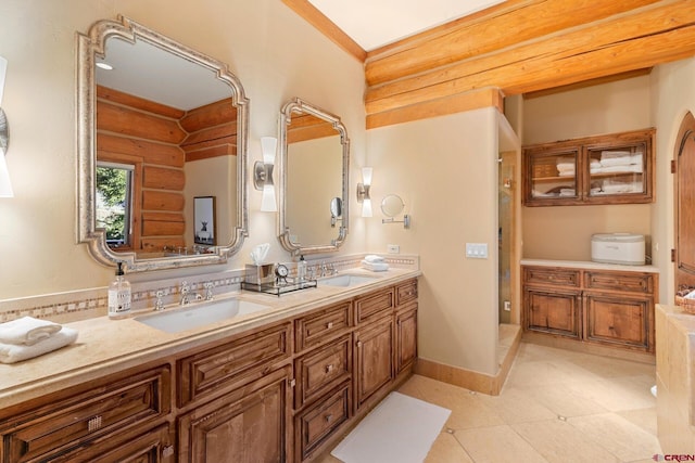 103 Double Eagle Way, Mountain Village, CO 81435 - bathroom with log walls, toilet, double sink vanity, and tile flooring