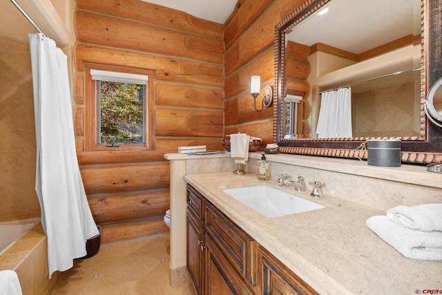 103 Double Eagle Way, Mountain Village, CO 81435 - full bathroom featuring toilet, shower / tub combo, log walls, tile floors, and vanity