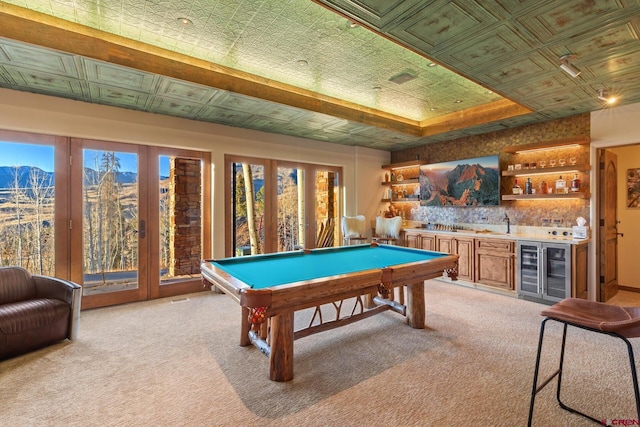 103 Double Eagle Way, Mountain Village, CO 81435 - playroom featuring indoor bar, a mountain view, pool table, light carpet, and a raised ceiling