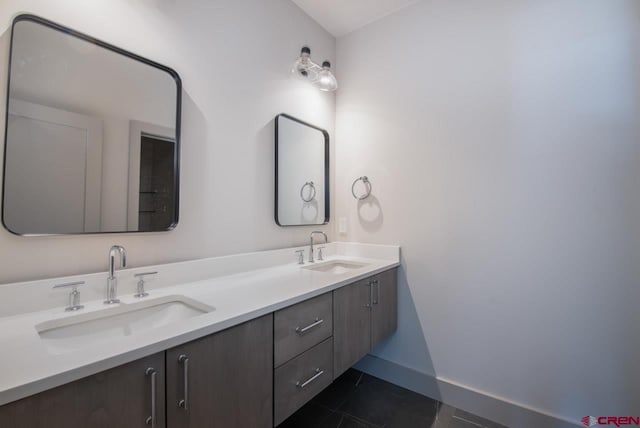 bathroom with vanity and tile patterned flooring