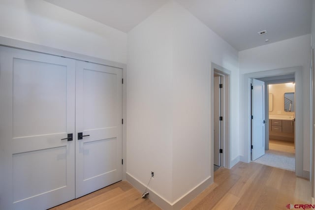 hall featuring light hardwood / wood-style flooring