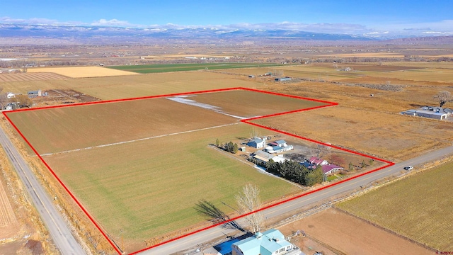 birds eye view of property featuring a rural view