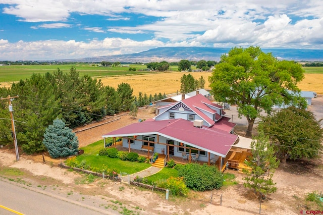 aerial view with a mountain view and a rural view