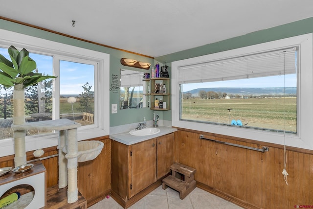 bathroom with vanity and tile patterned floors