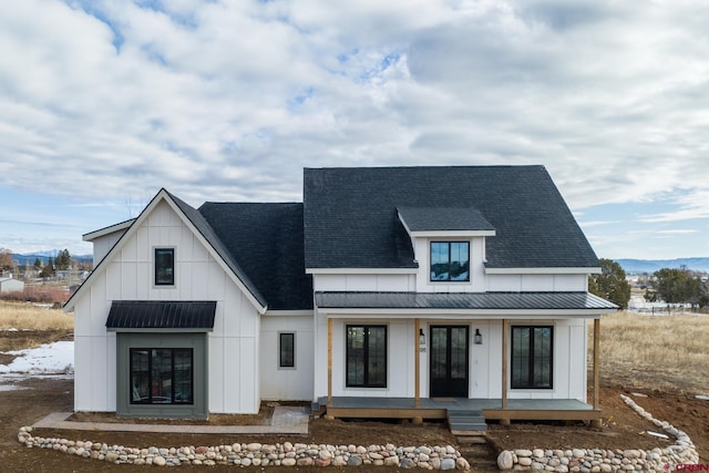 view of front of property featuring covered porch