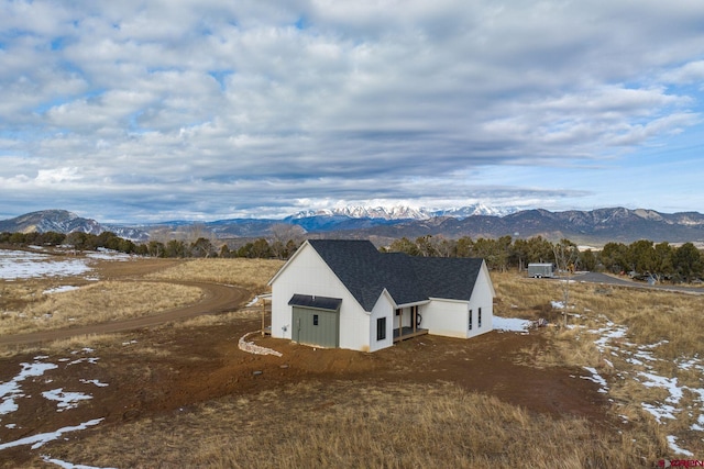 exterior space featuring a mountain view