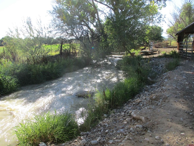 view of road featuring a water view