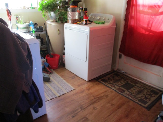 laundry area featuring light wood-type flooring